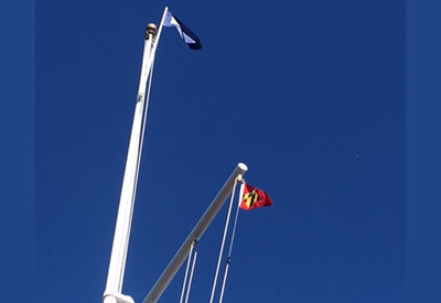 San Diego YC Flies Annapolis YC Burgee from its Flagpole in Wake of AYC Clubhouse Fire