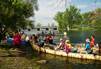 Paddlers complete month-long 850-km reconciliation canoe pilgrimage at the Kahnawake Mohawk Territory