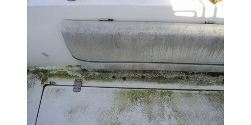 grime, dirt and algae breeding on a fibreglass boat deck