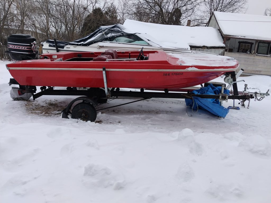 a photo of a red boat