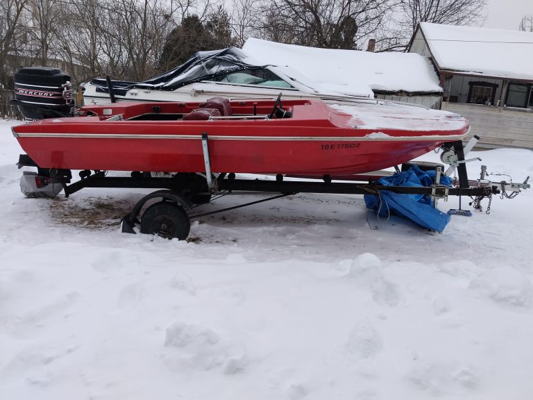 a photo of a red boat